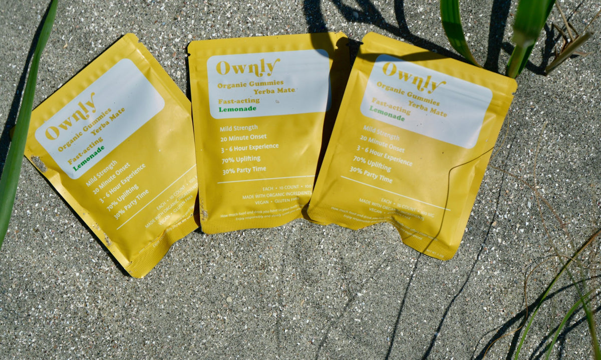 Lemonade gummy pouches on sand